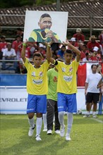 Entrance of the Brazilian team with an image of a recently murdered teammate