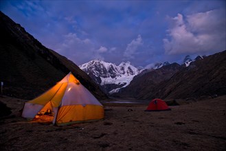Tent camp at lake Laguna Jahuacocha at dusk
