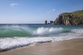 Waves break on the beach of Dalmore