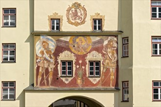 Medieval fresco with guardians in armour holding the Bavarian and Wasserburger standards below Jupiter on an eagle