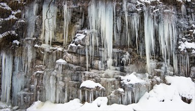 Icicles on rock wall