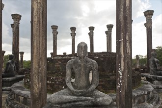 Buddha statue in a ruined temple