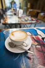 Cappuccino in a sidewalk cafe