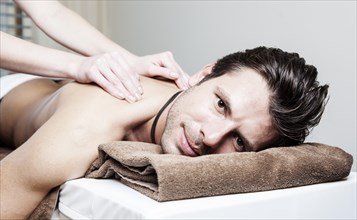 Man being massaged