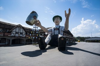 Huge inflatable doll wearing traditional Bavarian dress
