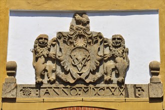 The coat of arms of the Dutch East India Company above the Portuguese Gate