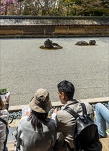 Tourists at Ryouan-ji Rock Garden