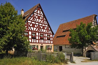 Half-timbered farmhouse on stone base