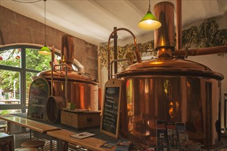 Copper brew kettles in an inn