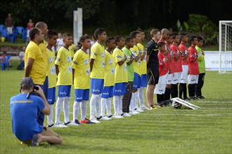 Teams from Brazil and Egypt singing their national anthems before a game