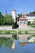 View over the Tauber river on the Roter Turm tower and the Kittsteintor