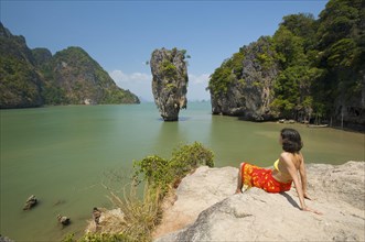 Woman with a view of Khao Phing Kan or James Bond Island
