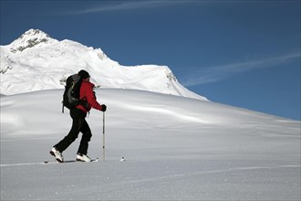 Ski tourer in the high valley above Lech am Arlberg