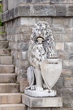 Sculpture of a lion in front of PeleÈ™ Castle