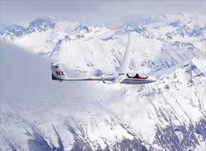 ASH 25 EB glider flying above the French Maritime Alps