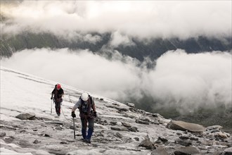 Mountain climbers ascending the Grande Mesule