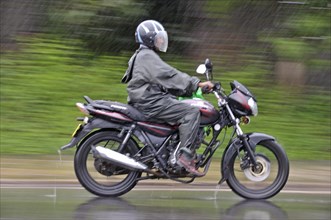 Motorcycle in heavy rain