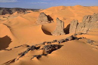 Rocks and sand dunes of Moul Naga