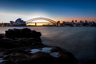 The Sydney Opera House and Harbour Bridge at dusk