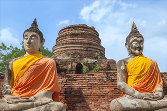 Buddha statues next to the central stupa