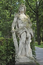 Baroque sculpture of Hercules wearing a lion skin