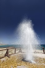 Blowhole at the beach of Al Mughsail