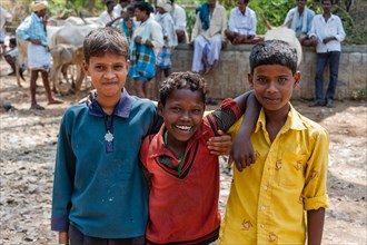 Three smiling Indian children