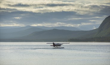 Seaplane taking off from Saggat Lake near Arrenjarka island