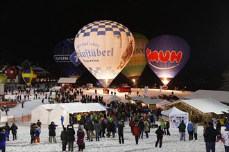 Night glow at the Montgolfiade balloon event in Tegernsee