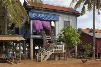 Stilt house on the banks of the Mekong River