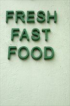 Lettering ' fresh fast food'