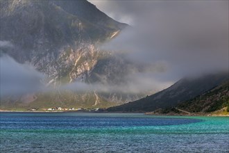 Fog moving over a fjord near Flakstad