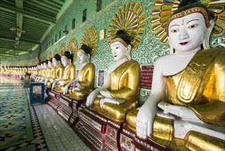 Many seated Buddha sculptures