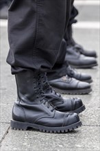 Members of a right-wing Hungarian party wearing combat boots