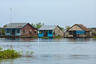 Houseboats of a floating village on the Tonle Sap lake