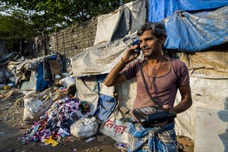 Man working at Dharavi Slum