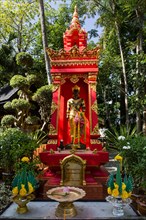 King Mangrai statue in a shrine in the garden of Wat Phra Kaeo