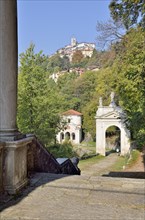 View over Arco di San Ambrosio arch and Chapel X towards the Sanctuary of Santa Maria del Monte