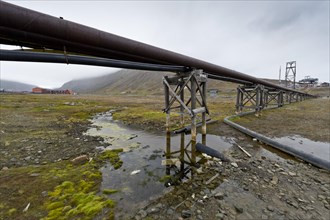 Utility pipes and supply lines installed above ground because of the permafrost