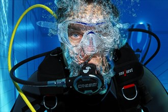 Scuba diver with air bubbles