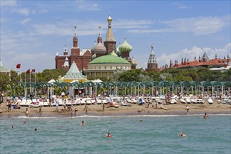 Beach with the Kremlin Palace Hotel and a Kremlin replica