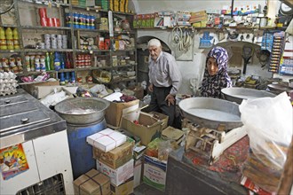Woman shopping in a typical shop in the historic centre