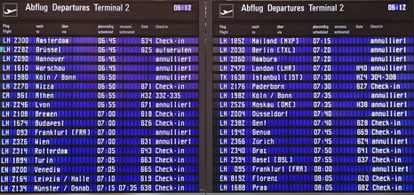 Flight departures board with many cancelled flights