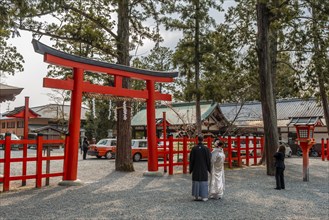 Wedding couple in front of Torii