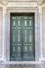 The bronze doors of the main entrance