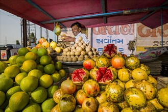 Man selling friut at a market