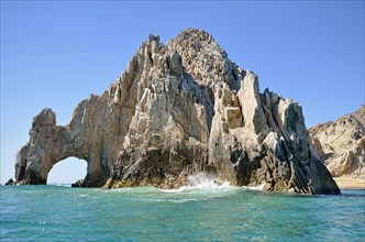 Rock arch El Arco with coastal rocks