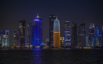 Skyline of Qatar at night with the World Trade Center