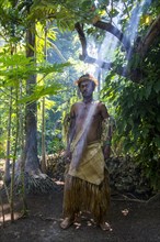 Traditional dressed man in the jungle