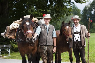 Farmers with pack horses
